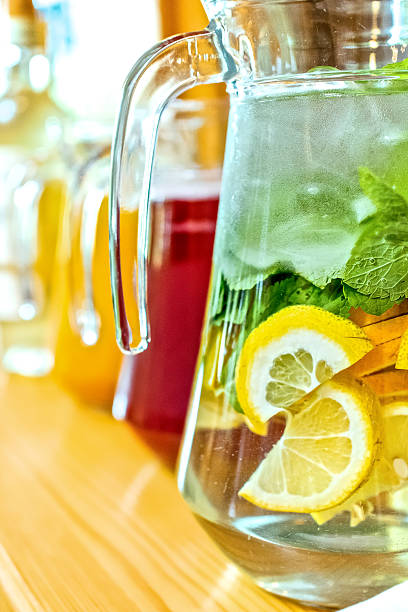 istock lemonade in jar with ice and mint 514372266