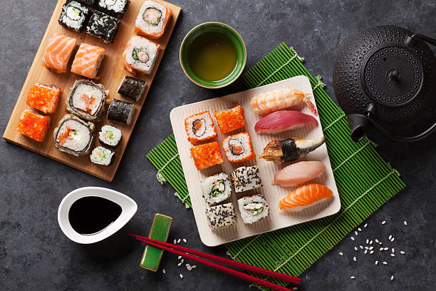 istock Set of sushi and maki roll and green tea 514373990