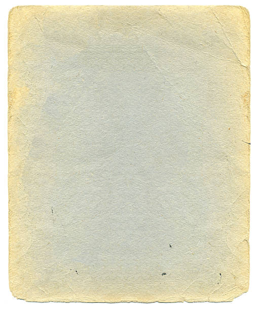 istock Old sheet of thick paper with yellowed edges 514376360