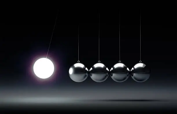 Balancing balls Newton's cradle, clean studio shot