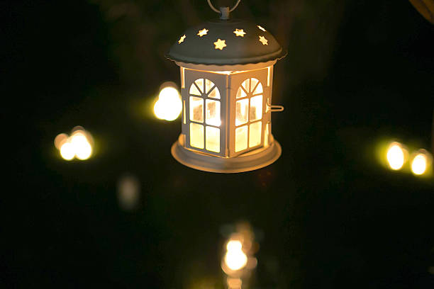 istock Candlestick house with candle light on the tree in nigth 514378960