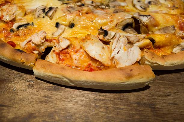 istock Pizza with mushrooms chicken and cheese 514381708