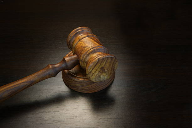 istock Real Judges Or Auctioneer Gavel On The Black Wooden Table 514386520