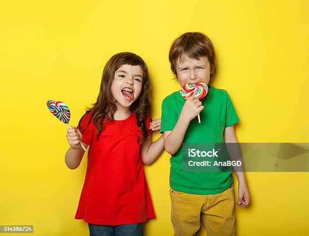 In Different Moods Stock Photo - Download Image Now - Candy, Child, Brother
