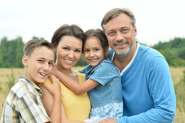 istock happy family at   field 514386992