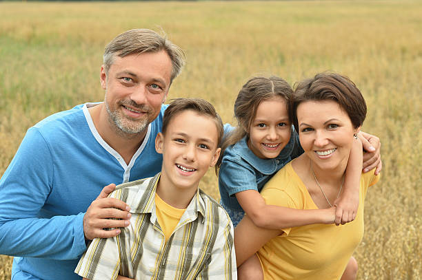 istock happy family at   field 514387358