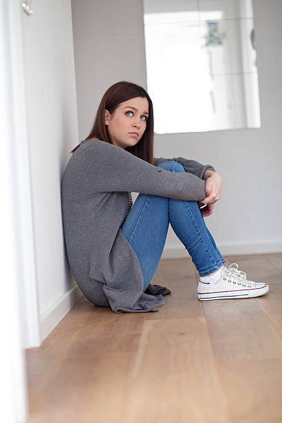 istock Depressed young woman 514388152