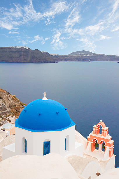 istock traditional blue dome with  sea, Santorini 514398535
