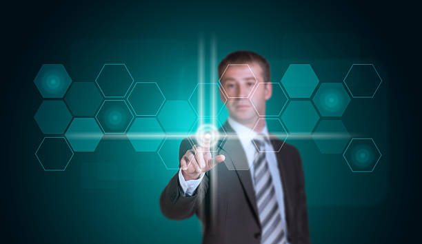 istock Businessman in suit finger presses virtual button 514399327