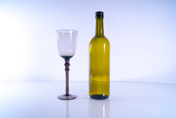istock Green Wine Bottle with Brown tall glass 514399587