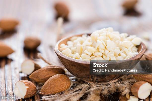 Almond Pieces Stock Photo - Download Image Now - Almond, Bowl, Chopped Food