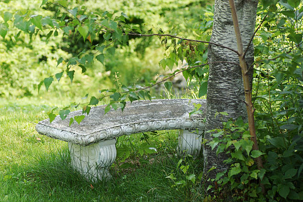 istock Marble bench in green forest, sunny day 514401409