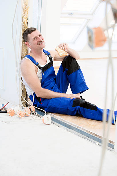repairman repairman having a break and eating a sandwich lazy construction laborer stock pictures, royalty-free photos & images