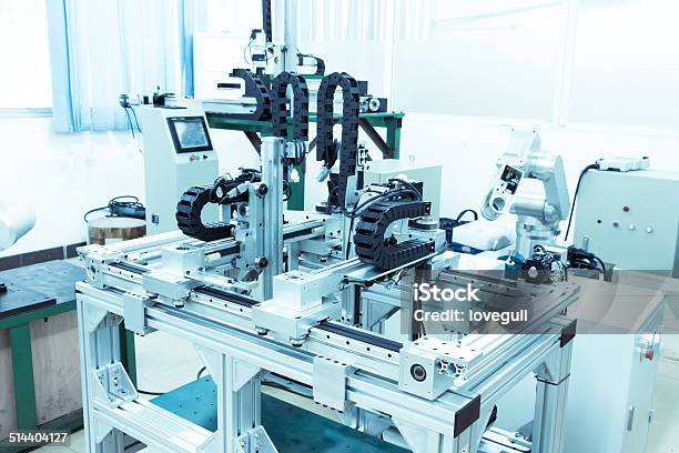 Modern Automatic Robot Assembly Line In Factory Of Heavy Industr Stock Photo - Download Image Now