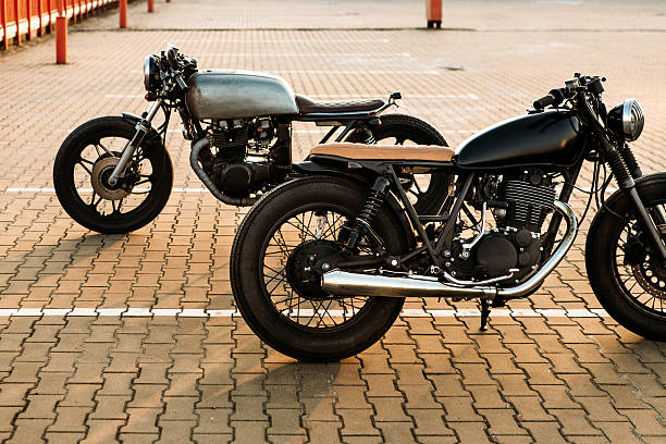 istock Two black and silver vintage custom motorcycles cafe racers 514405744