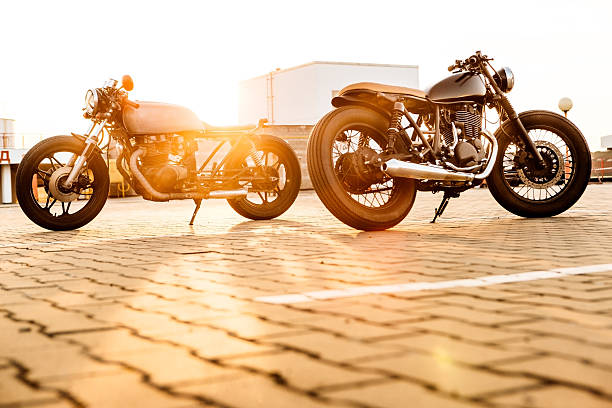 istock Two black and silver vintage custom motorcycles cafe racers 514405814