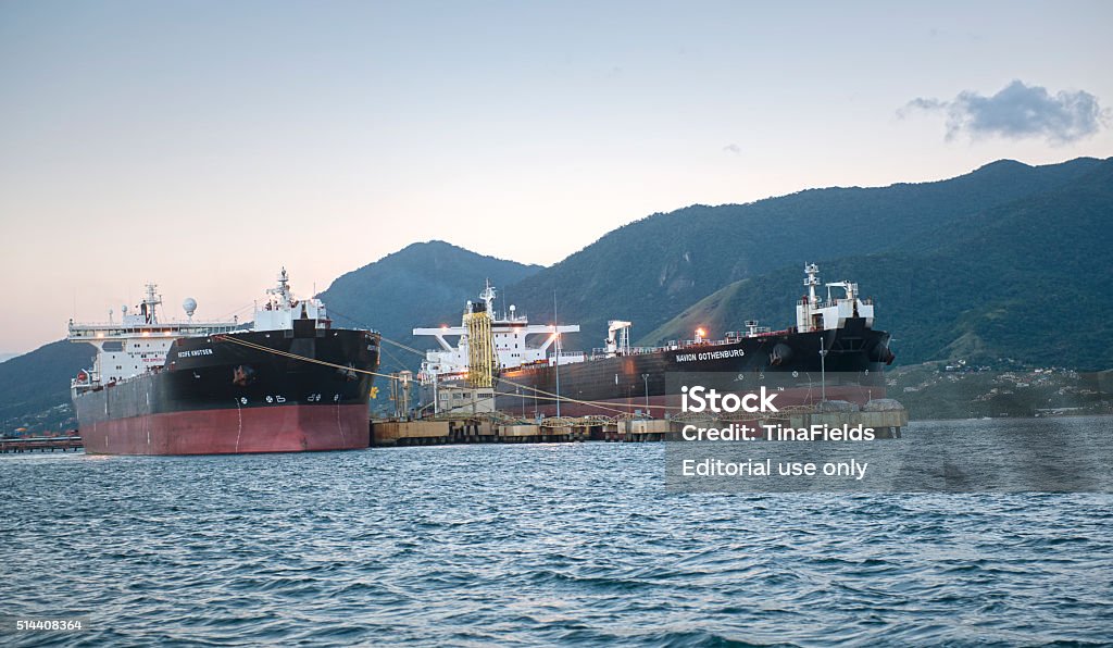 OIl industry in Brazil Sao Sebastiao, Brazil - March 3, 2015: Crude oil shuttle tankers Recife Knutsen, and Navion Gothenburg, unloading crude oil from Rio de Janeiro's Bacia de Campos platforms to be processed in Sao Paulo's refineries in the port of Sao Sebastiao, State of Sao Paulo, Brazil.  Brazil Stock Photo