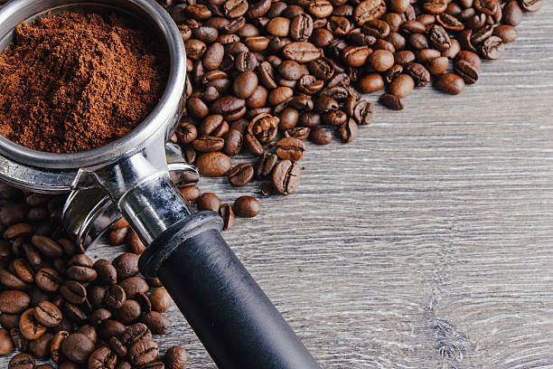 istock Portafilter and Coffee Beans On Wood Background 514408544