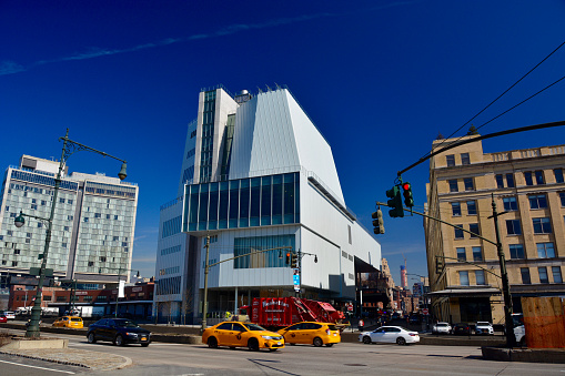 New York, USA - March 9, 2016: View of the new Whitney museum taken from the street in Manhattan on a sunny day in the Meatpacking District. The new museum, a six-story, asymmetrical building designed by Renzo Piano, will house more of the museums 18,000-piece permanent collection.