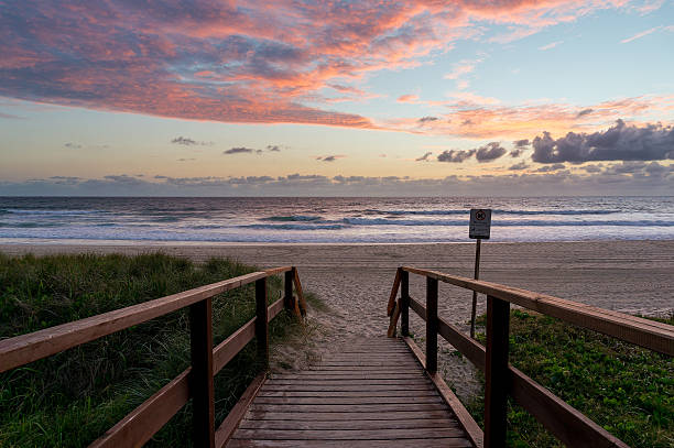 istock Beautiful ocean beach entrance at sunrise 514411342
