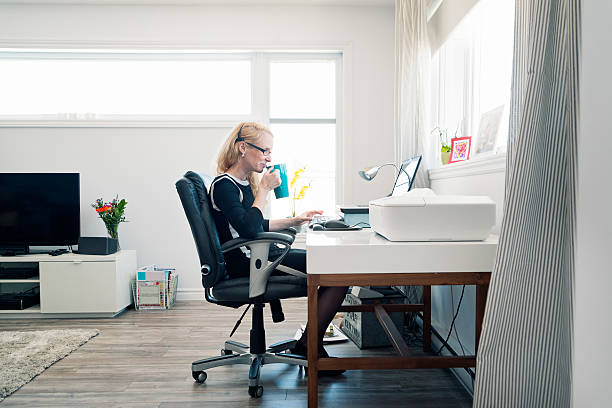 istock Woman working from home office, full length with copyspace. 514412002