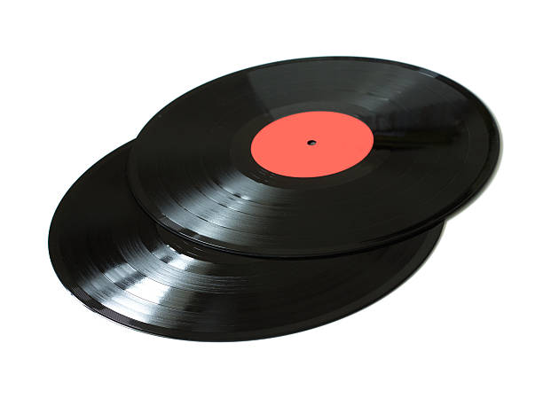 istock Two  black long-play vinyl records isolated closeup 514412106