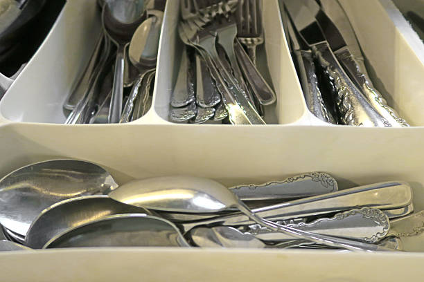 istock Inside a home kitchen drawer with knives, forks, spoons 514412822