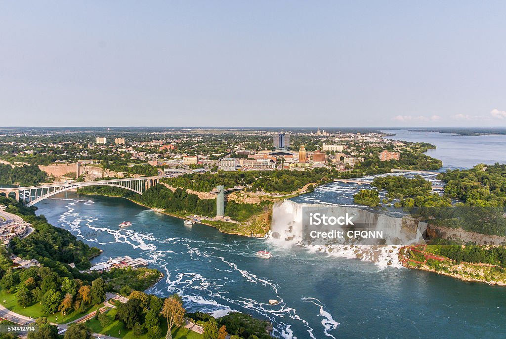 Niagara Falls Aerial View, American Falls Niagara Falls Aerial View, American Falls with the view on the Rainbow Bridge from the top, Ontario, Canada Aerial View Stock Photo