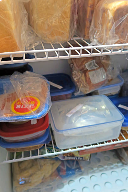istock Inside a home freezer with bread and  food in containers 514413112