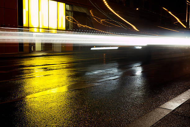 istock Motion blurred headlights car traffic night 514415426
