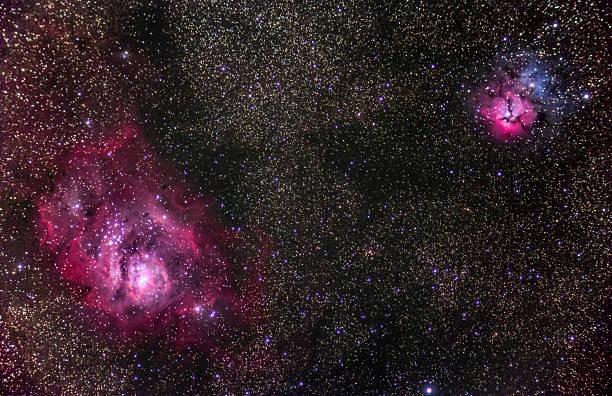 istock The Lagoon and Trifid Nebulae from Alentejo Sky 514416194