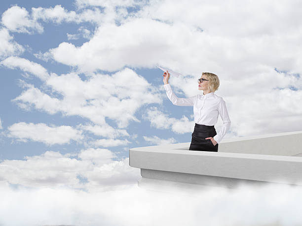 istock Woman with a paper plane 514417840