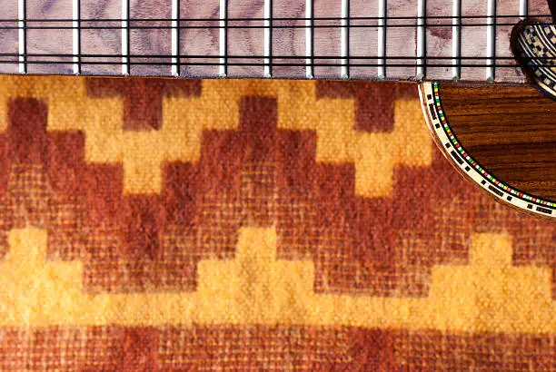 Close-up of a peruvian charango on an alpaca wool blanket. Image taken with Nikon D60 and developed from Raw.