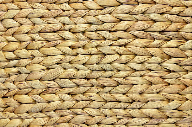 Corn Husk Background Natural handmade woven corn husk surface as a background interlace format stock pictures, royalty-free photos & images