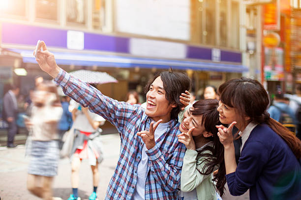 istock Group of young japanese people making selfie, Tokyo, 514419210