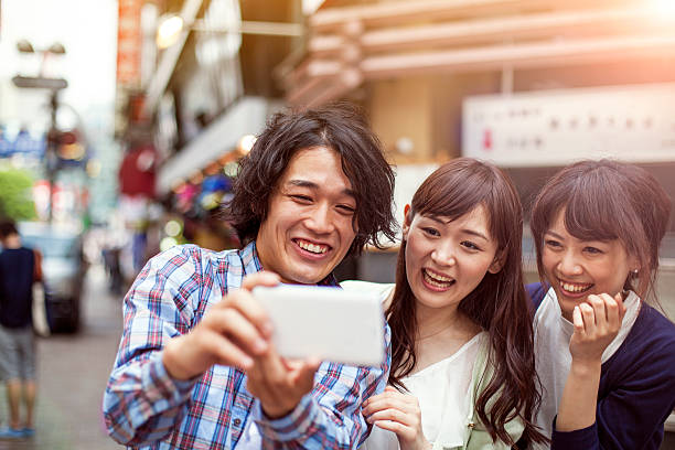 istock Group of young japanese people making selfie, Tokyo, 514419528
