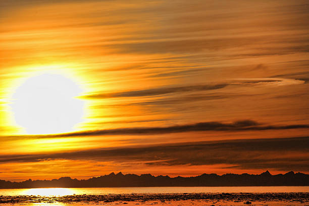 sunset 2 cook inlet stock photo
