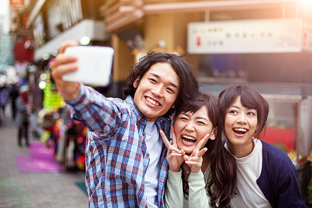 istock Group of young japanese people making selfie, Tokyo, 514420136