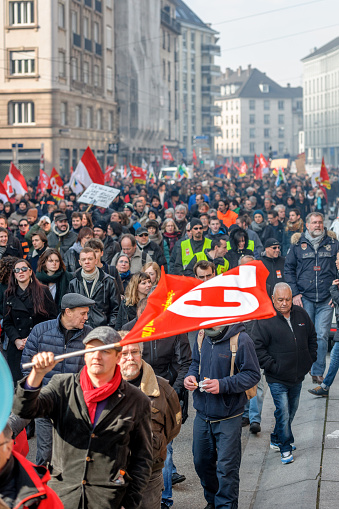 Strasbourg, France - March 9, 2016: Large crowd perspective of thousands of people demonstrating as part of nationwide day of protest against proposed labor reforms by Socialist Government