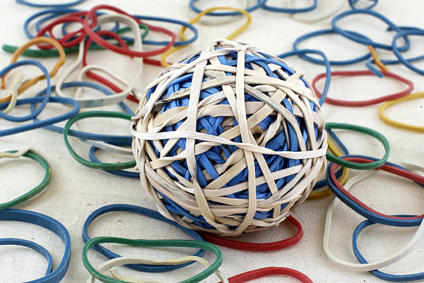 elastico palla - flexibility rubber rubber band tangled foto e immagini stock