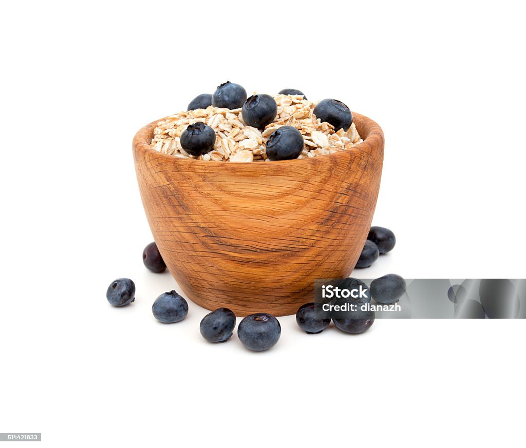 Blueberries and oats Blueberries and oats over white Arrangement Stock Photo