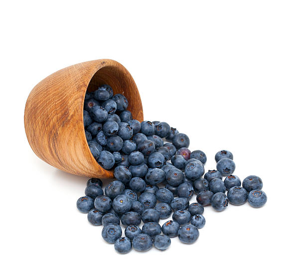 istock blueberries in a wooden bowl 514421997