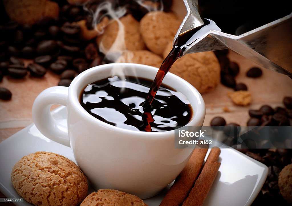 pour the coffee pour the coffee into ceramic cup Coffee - Drink Stock Photo