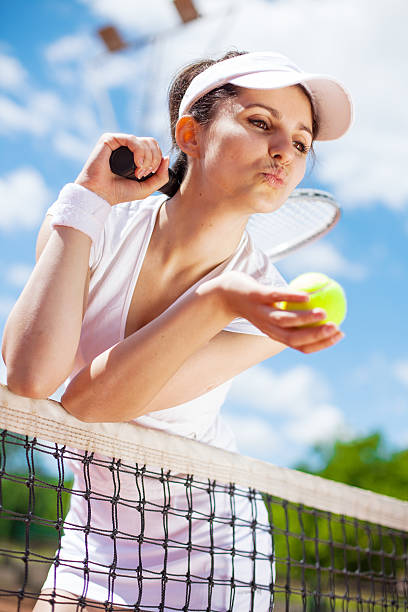 istock Female playing tennis 514437725