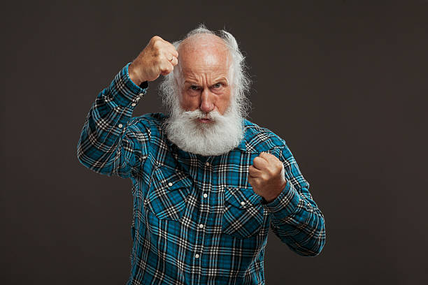 istock old man with a long beard with big smile 514437969