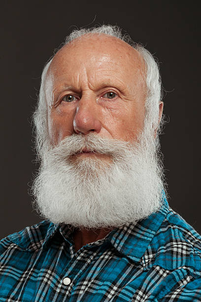 istock old man with a long beard with big smile 514438003