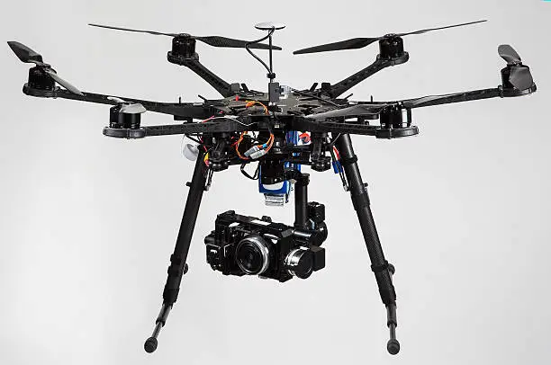 A hexacopter with a camera isolated on a white background