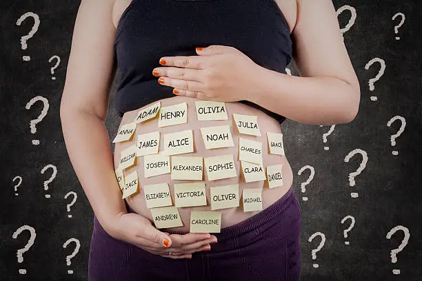 Photo of Pregnant woman finding baby names