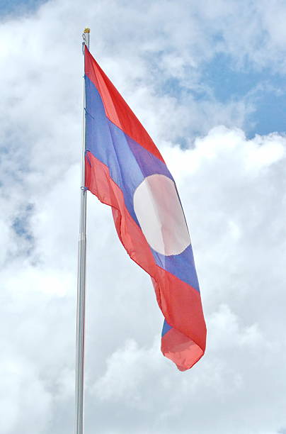 istock Laos Flag on Sky and clouds background 514441881