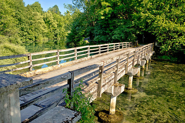 istock Korana river old wooden bridge in Slunj 514442603